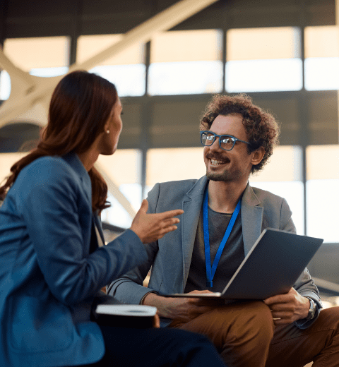 Consultancy - two people discussing something at work